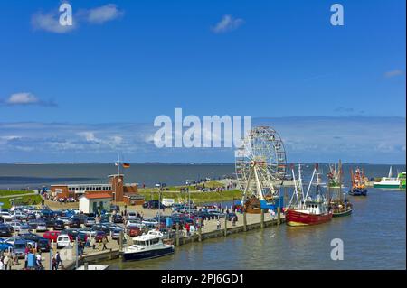 Taglierina di granchio decorata nel porto di Neuharlingersiel, Carousel, distretto di Wittmund, Germania Foto Stock