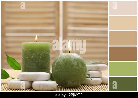 Tavolozza di colori e composizione con pietre spa e candele su tappetino di bambù. Collage Foto Stock