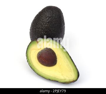 Avocados, Persea, americana, sind Suedfruechte, und als Frucht botanisch gesehen Beeren, Avocados, Persea, americana, sono frutti del sud, e botanica Foto Stock