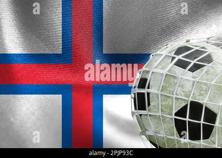 UEFA EURO 2024 Calcio, Isole Faroe bandiera nazionale con una palla di calcio in rete, 3D lavoro e 3D immagine. Yerevan, Armenia - 2023 aprile 03 Foto Stock