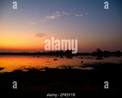 Sunset over Selinda Reserve, Botswana Stock Photo