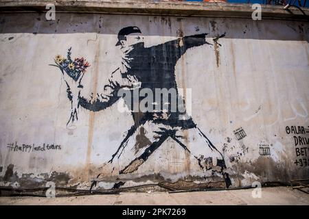Graffiti Banksy in Cisgiordania occupata, Palestina Foto Stock
