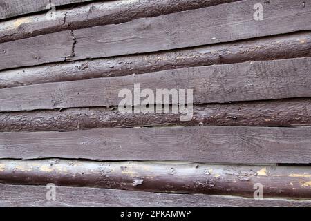 Vecchia recinzione economica di legno fatta di assi Foto Stock