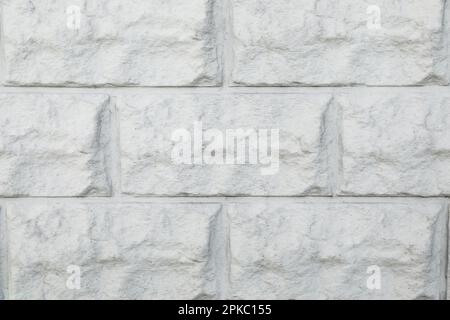 Struttura di muro di mattoni grigi come sfondo Foto Stock