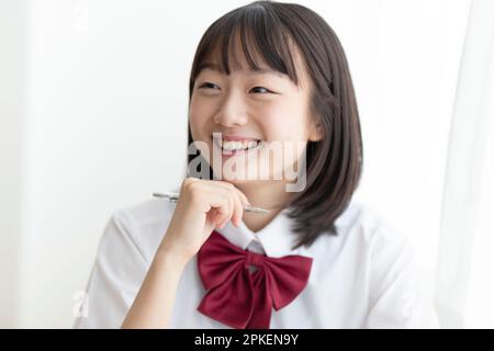 Ragazze della scuola superiore che prendono una classe Foto Stock