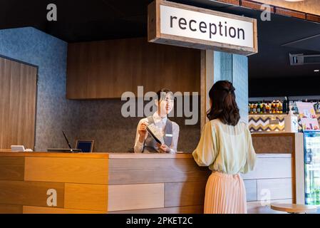 Banco check-in dell'hotel Foto Stock