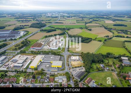 Vista aerea, zona di costruzione nuovo edificio per la Galleria Mensing all'incrocio Werler Straße Unnaer Straße nel quartiere Rhynern a Hamm, Ruhr Foto Stock