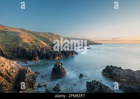 Scogliere costiere a Porthor (Whistling Sands), Llyn Peninula, Galles Foto Stock