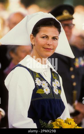 LA REGINA SVEDESE SILVIA in costeme folk- Sverige Dräkten- alla Giornata Nazionale di Skansen a Stoccolma Foto Stock