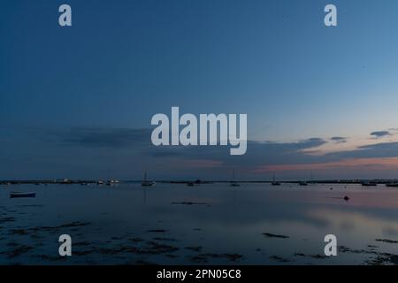 Estuario del Mersea occidentale al tramonto Foto Stock