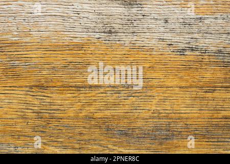 Texture di un vecchio pannello di legno giallo, beige primo piano. Foto Stock