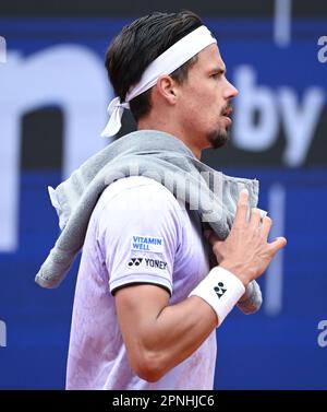 Monaco, Germania. 19th Apr, 2023. Tennis: ATP Tour - Monaco, single, 1st round, uomini. Karazew (Russia) - Altmaier (Germania). Daniel Altmaier in azione. Credit: Sven Hoppe/dpa/Alamy Live News Foto Stock