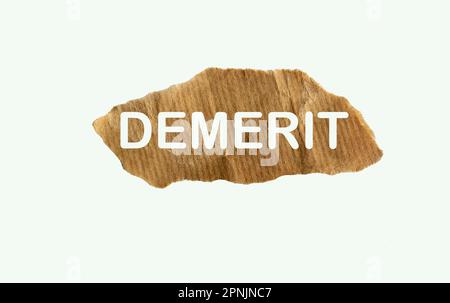 Simbolo di carenza. Parola di concetto demerit su un pezzo di carta. Bellissimo sfondo bianco, spazio copia. Concetto di business e svantaggi. Foto Stock