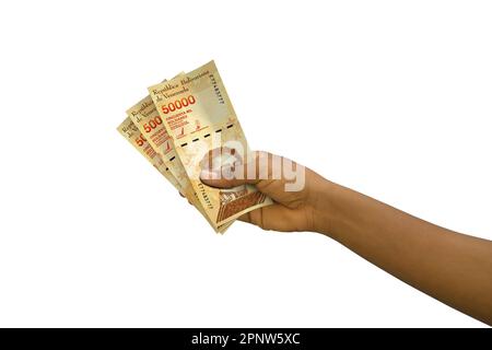 Fair Hand Holding 3D reso 20000 venezuela bolívares note isolate su sfondo bianco Foto Stock