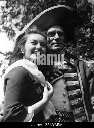 JANETTE SCOTT e LAURENCE OLIVIER sul candid set location a Tring, Hertfordshire durante le riprese del DISCEPOLO del DIAVOLO del 1959, il REGISTA HAMILTON e (non accreditato) ALEXANDER MACKENDRICK sulla base della sceneggiatura di George Bernard Shaw John Dighton e della musica di Roland Kibbee Richard Rodney Bennett costumi Mary Grant produttori co-esecutivi Kirk Douglas e Burt Lancaster Hecht-Hill-Lancaster Productions / Brynaprod Artisti Uniti Foto Stock