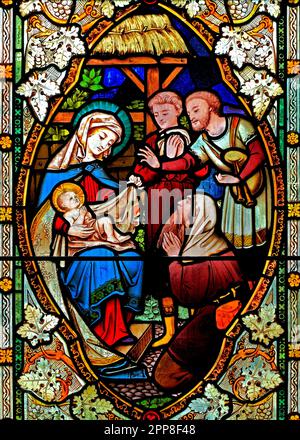 La Natività, nascita di Gesù, vetrata, di Ward & Hughes, 1869, Stanhoe, Norfolk, Inghilterra, REGNO UNITO Foto Stock