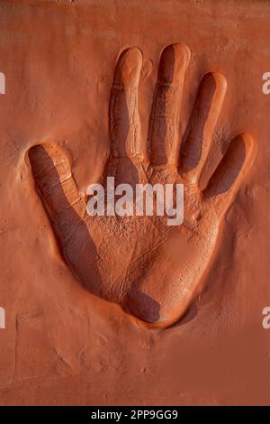 Stampa a mano delle fatiche coinvolte nella costruzione del Monumento al Pakistan Foto Stock