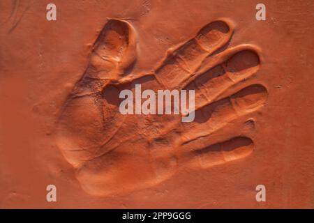 Stampa a mano delle fatiche coinvolte nella costruzione del Monumento al Pakistan Foto Stock