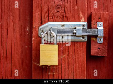 Vecchia serratura sulla porta di legno Foto Stock