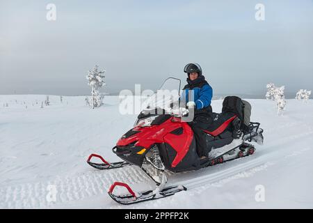 Gita in motoslitta in Lapponia Foto Stock