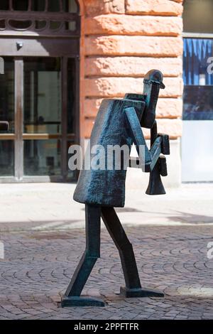 Orchestra ottimista, attraente scultura in strada presso la piazza del mercato di Stortorget, Malmo, Svezia Foto Stock