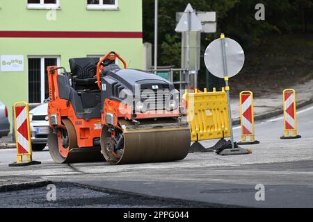 Cantiere stradale, ingegneria civile, asfaltatura Foto Stock