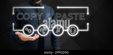 Segno di testo che mostra Copia Incolla. Concetto che significa imitazione, trascrizione o riproduzione di un'opera originale Foto Stock