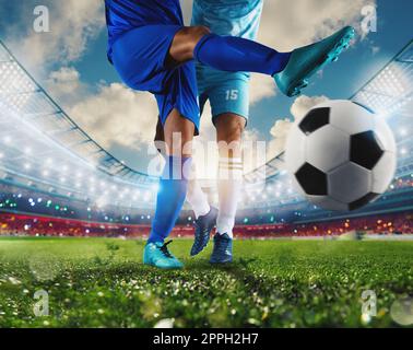 Scena calcistica con giocatori di calcio in competizione allo stadio Foto Stock