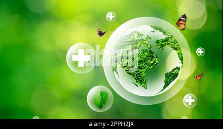 Globo verde all'interno di mongolfiere concept che proteggono l'ambiente e la natura Foto Stock
