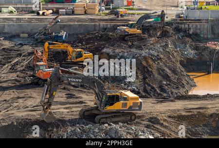 Escavatori in cantiere Foto Stock