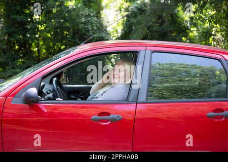 Guidare un'auto Foto Stock