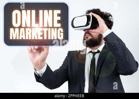 Cartello di testo che mostra il marketing online. Approccio aziendale pratica di sfruttare i canali Web per diffondere un messaggio Foto Stock