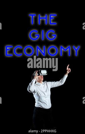 Cartello che mostra la Gig Economy. Business Concept mercato dei contratti a breve termine lavoro indipendente temporaneo Foto Stock