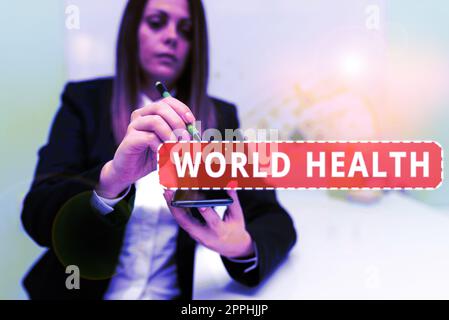 Scrittura a mano testo World Health. Parola scritta sulla Giornata Mondiale d'azione dedicata alla lotta contro la fame nel mondo Foto Stock