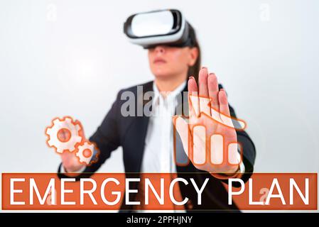 Scrittura del testo piano di emergenza. Procedure di approccio aziendale per la risposta alle emergenze più importanti devono essere preparate Foto Stock