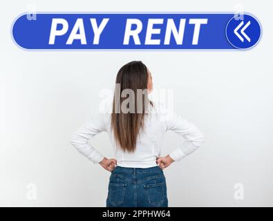 Cartello con su scritto Pay Rent. Concetto del Internet per pagare i soldi in cambio dell'uso della proprietà qualcun'altro Foto Stock