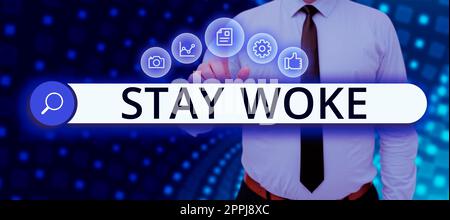 Scrittura che mostra il testo rimanere svegliato. Parola per essere consapevoli del vostro ambiente circostante e le cose in corso tenere informato Foto Stock