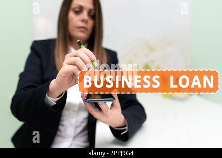 Scrittura a mano segno prestito d'affari. Business idea credito ipoteca Assistenza finanziaria Cash anticipa il debito Foto Stock