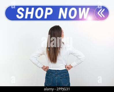 Ispirazione mostra segno Acquista ora. Approccio aziendale l'azione o l'attività di acquisto di beni da negozi o online Foto Stock