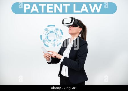 Testo scritto a mano Legge sui brevetti. Parola scritta su tratta del diritto esclusivo di un inventore di utilizzare la propria invenzione Foto Stock