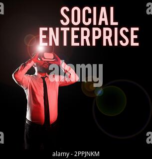 Ispirazione che mostra il segno Social Enterprise. Business Concept Business che fa soldi in modo socialmente responsabile Foto Stock