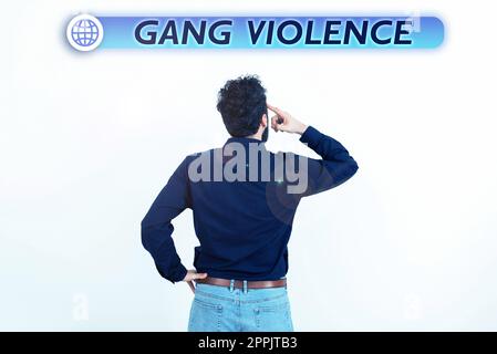 Testo che mostra ispirazione Gang violenza. Parola scritta sulla violazione delle leggi provocata da un gruppo di criminali e gangster Foto Stock