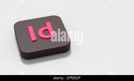 Icona dell'applicazione Adobe InDesign su sfondo grigio con spazio di copia Foto Stock
