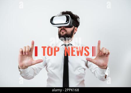 Ispirazione mostra il segno Top News. Concetto che indica le informazioni ricevute e trasmesse su un evento Foto Stock