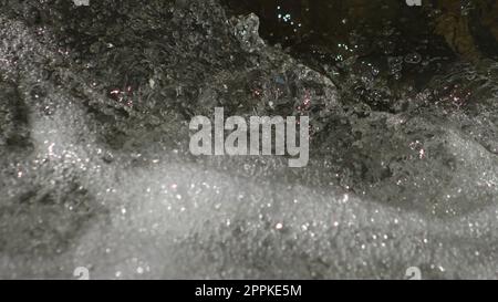 acqua che scorre sfondo e sfondi Foto Stock