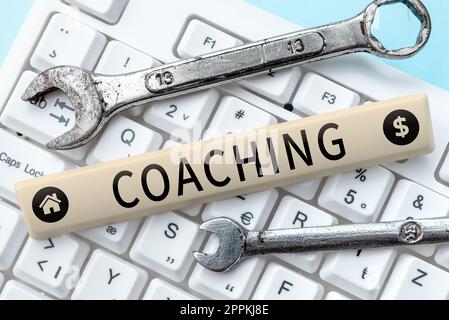 Didascalia di testo che presenta il coaching. Panoramica aziendale sbloccare un potenziale di persone per massimizzare le proprie prestazioni Foto Stock