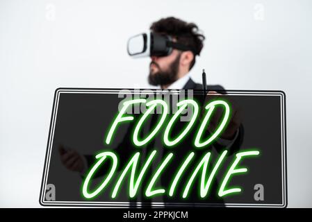 Scrittura a mano di testo Food Online. Concetto che significa varietà di cibo istituito in un sito web direttamente consegnato dal negozio Foto Stock