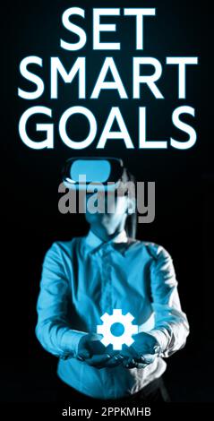 Segno che mostra Set Smart Goals (Imposta obiettivi intelligenti). Parola per stabilire gli obiettivi realizzabili fare buoni programmi di affari Foto Stock