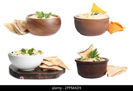 Set con delizioso hummus con pita chips su sfondo bianco Foto Stock