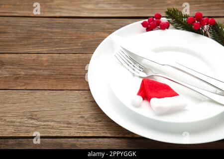 Tabella di Natale luogo impostazione. Sfondo delle feste. Vista dall'alto Foto Stock